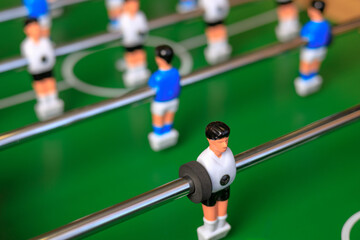 Fototapeta premium close-up of the players in the table football of plastic players