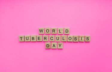 On March 24, World Tuberculosis Day, a minimalistic banner with an inscription in wooden letters