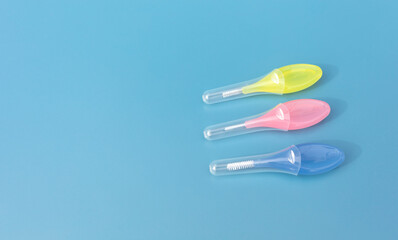 Mockup Colorful Interdental Toothbrush For Cleaning Between Teeth On Blue Background . Toothpick...