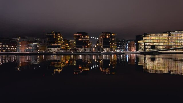 Drammen city, Norway. The river is called Drammenselva, and the bridge is called Ypsilon.  The city's library is located on the right side of the river.