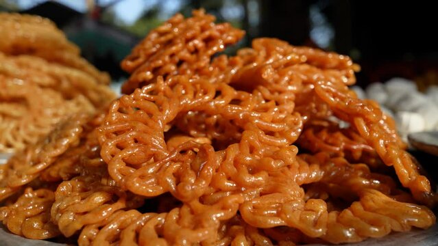 Jalebi is a traditional Indian sweet made from sugar, often enjoyed during festivals. This light and crispy treat is a beloved part of Indian culinary heritage and festive celebrations