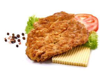 Homemade breaded chicken Wiener schnitzel, isolated on white background.
