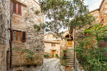 Fototapeta na wymiar Street view of an old medieval Italian countryside.