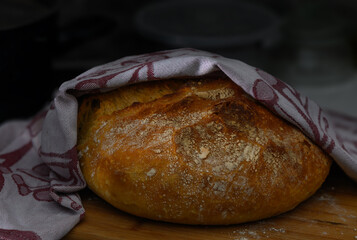 homemade freshly baked bread on the kitchen table 1