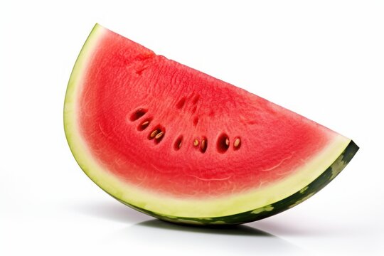  a slice of watermelon sitting on top of a white table next to a slice of watermelon on top of a slice of another piece of watermelon.
