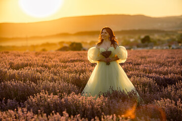 Woman lavender field. Lavender field happy woman in yellow dress in lavender field summer time at...