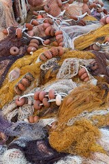 close-up detail of floats and fishing nets for trawlers in many different colours