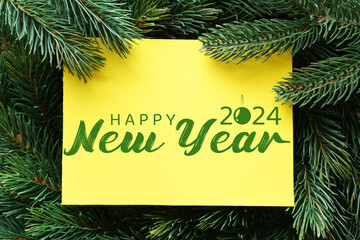 Greeting card for Happy New Year 2024 with green fir branches