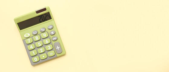 Calculator on yellow background with space for text