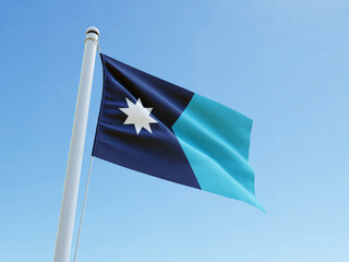 Minnesota state flag waving on flag pole in clear blue sky
