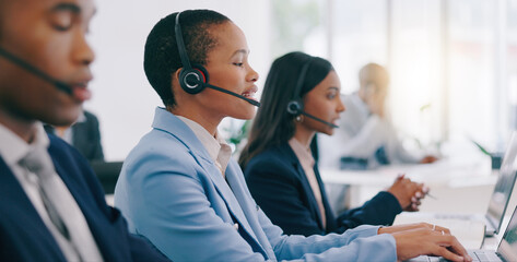 Business people, telemarketing and customer service with conversation, black woman or tech support. Staff, group or professional with headphones, office or internet with crm, call center or help desk - obrazy, fototapety, plakaty