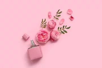 Fototapeten Beautiful composition with bottle of perfume and rose flowers on pink background © Pixel-Shot