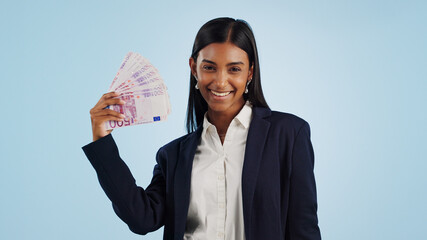 Happy business woman, portrait and money fan in financial freedom against a blue studio background....
