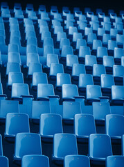 blue seats in a stadium.Minimal sport concept
