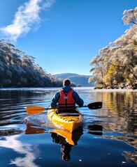 kayaker paddles down loch ness in snow and ice