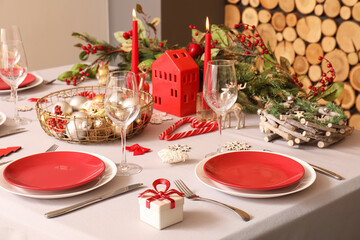 Christmas table setting with beautiful decorations, closeup