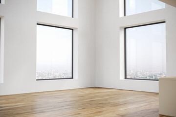 Modern empty apartment interior with white walls and big panorama windows.