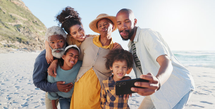 Selfie, hug and happy family at a beach for travel, fun or adventure in nature together. Love, profile picture and African kids with parents and grandparents at the sea for summer, vacation or trip