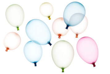 Inflated rubber colorful balloons fly in air. Many colorful inflated balloons in red, blue, yellow throw scatter. Toy for kid to play in birthday party and celebrate, white background isolated