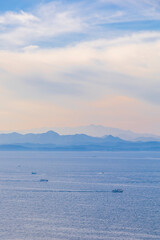 boats floating on the sunset