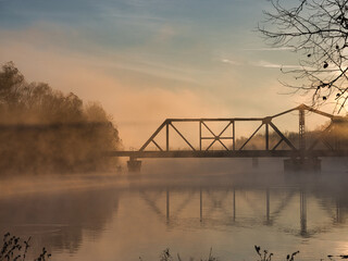 sunrise over the river bridge