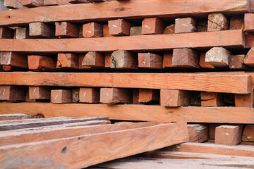 Skilled Hands at Work: Elegant Transformation of Ulin Wood into High-Quality Building Material