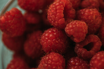 raspberries on a white background