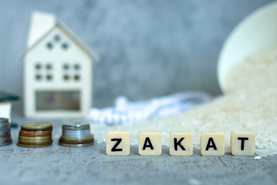 https://submit.shutterstock.com/reviewed#:~:text=Wooden%20cubes%20with%20text%20Zakat%2C%20coins%20stacked%20and%20mini%20house%20on%20the%20background.%20Zakat%20income%20and%20property%20concept