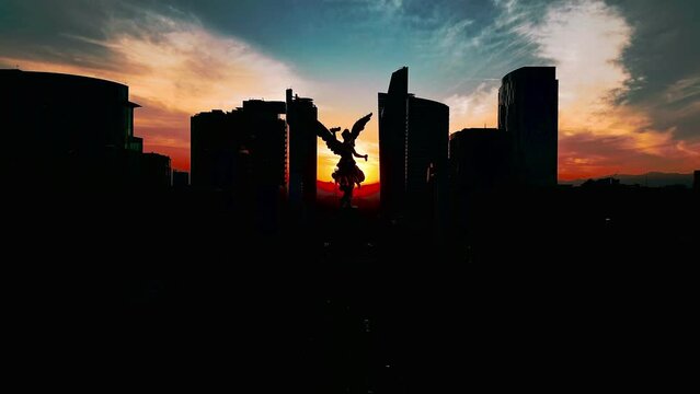 sunset in the Mexico city downtown, angel de la independencia landmark