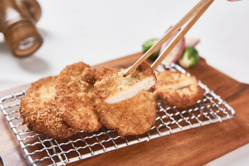 The crispy, delicious pork cutlet on the grill