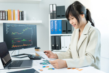 Business women calculate benefit, spreadsheets, graph financial development, bank accounts,...