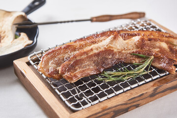 Deliciously cooked pork belly and grilled mushrooms