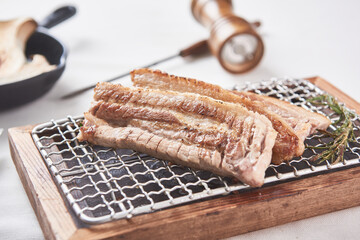 Deliciously cooked pork belly and grilled mushrooms