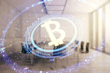 Double exposure of creative Bitcoin symbol hologram on a modern meeting room background....
