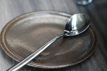 Empty Plate Table Setting with ladle on plate ready to use