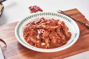 Spicy and delicious seasoned pork tripe on a plate