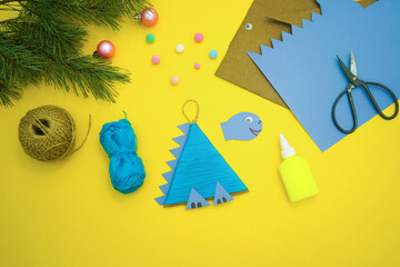Step-by-step instructions how to made christmas tree toy a dinosaur made by a child out of...