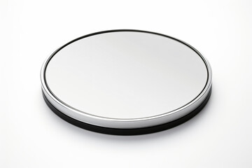 a round mirror on a white surface