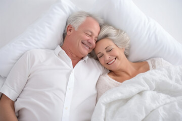 a man and woman laying in bed together