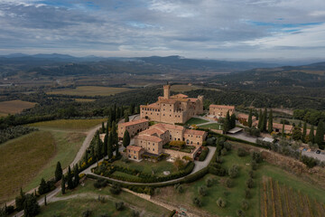 Obraz premium aerial view of the Poggio alle Mura Castle and Villa Banfi wine resort in Tuscany