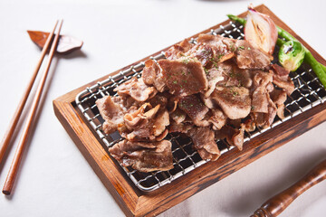 Grilled frozen pork neck
