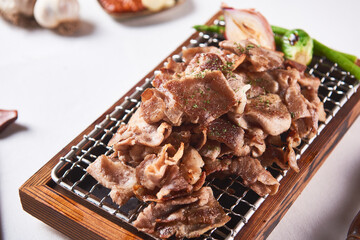 Grilled frozen pork neck