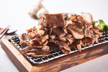 Grilled frozen pork neck