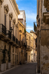 Fototapeta na wymiar typical city street in the Old Town center of Lecce in Apulia