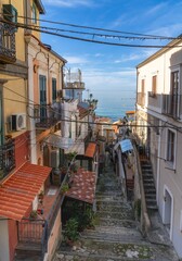 view of a narrow village street in Pizzo Calabro in typical Italian shabby chic style