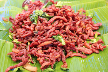 Fried pork put on banana  leaf thailand style, for sale