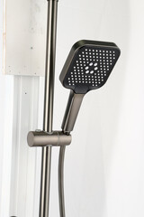 The grey slide bar set features an adjustable hand shower. Its modern look suits any bathroom, and multiple spray settings let you customize your shower experience.
