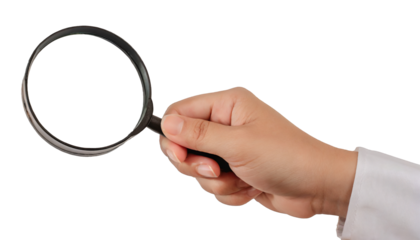 Hand holding a magnifying glass - isolated on transparent background