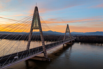 Aerial view about the famous Megyeri bridge at sunset.