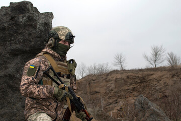 Fototapeta premium Ukrainian soldier with a machine gun